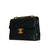 Vintage Black Jumbo 24K Single Flap Bag
