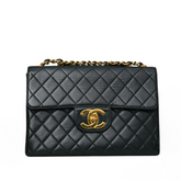 Vintage Black Jumbo 24K Single Flap Bag